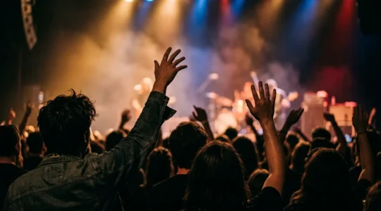 Energetic indie rock concert scene with engaged audience in intimate venue