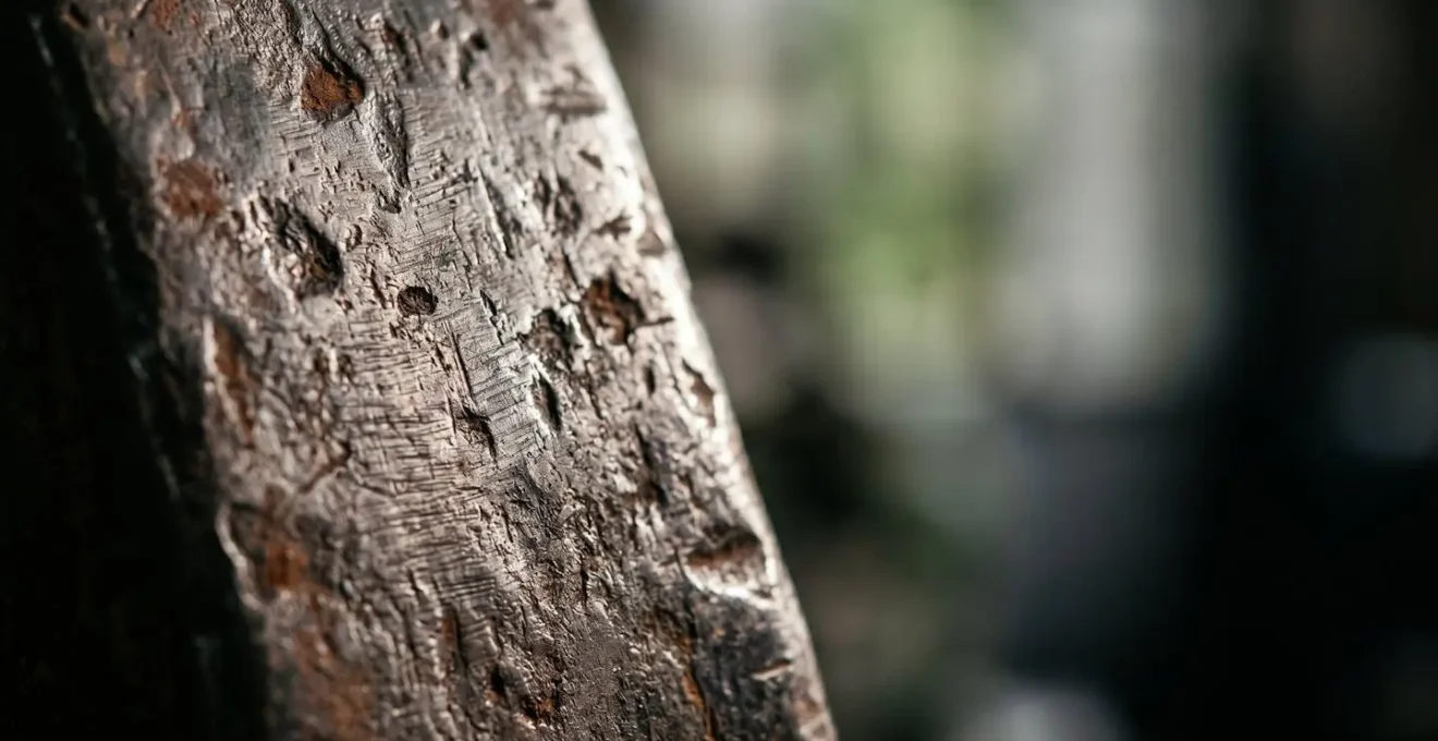 Extreme close-up of industrial metal surface showing detailed texture and impact marks